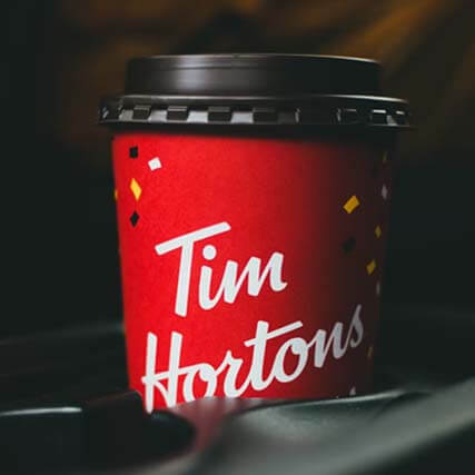 Closeup of a Tim Hortons cup with the logo in view.